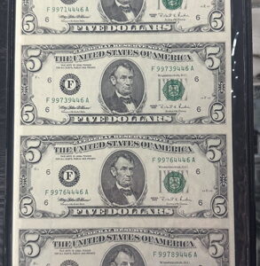 Uncut sheet of $5 notes